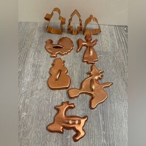 Vintage copper coloured metal cookie cutters x 8